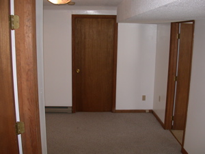 View of Apartment From Outside Bathroom Door